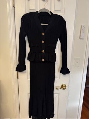 Elegant Black Knit Peplum Skirt Set with Gold Buttons